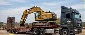 Porte-char transportant une excavatrice